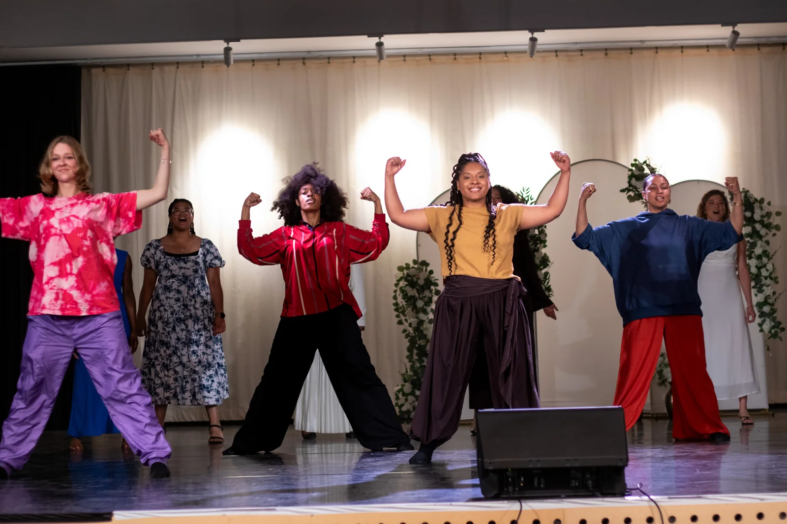 A group performing a dance on stage