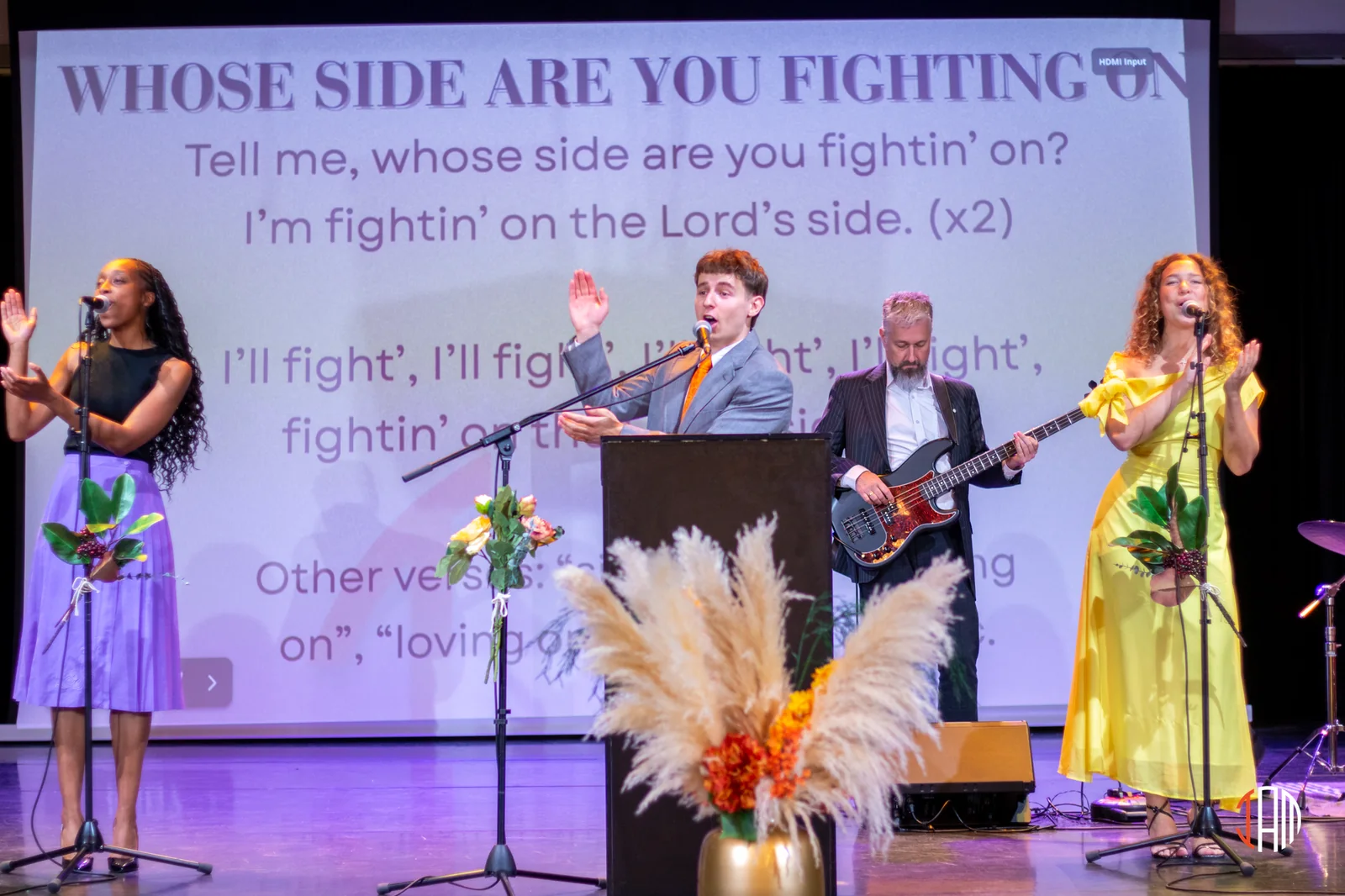 Singers and musicians leading worship together