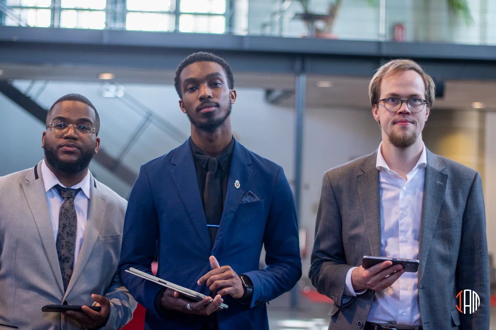 Three men together at church