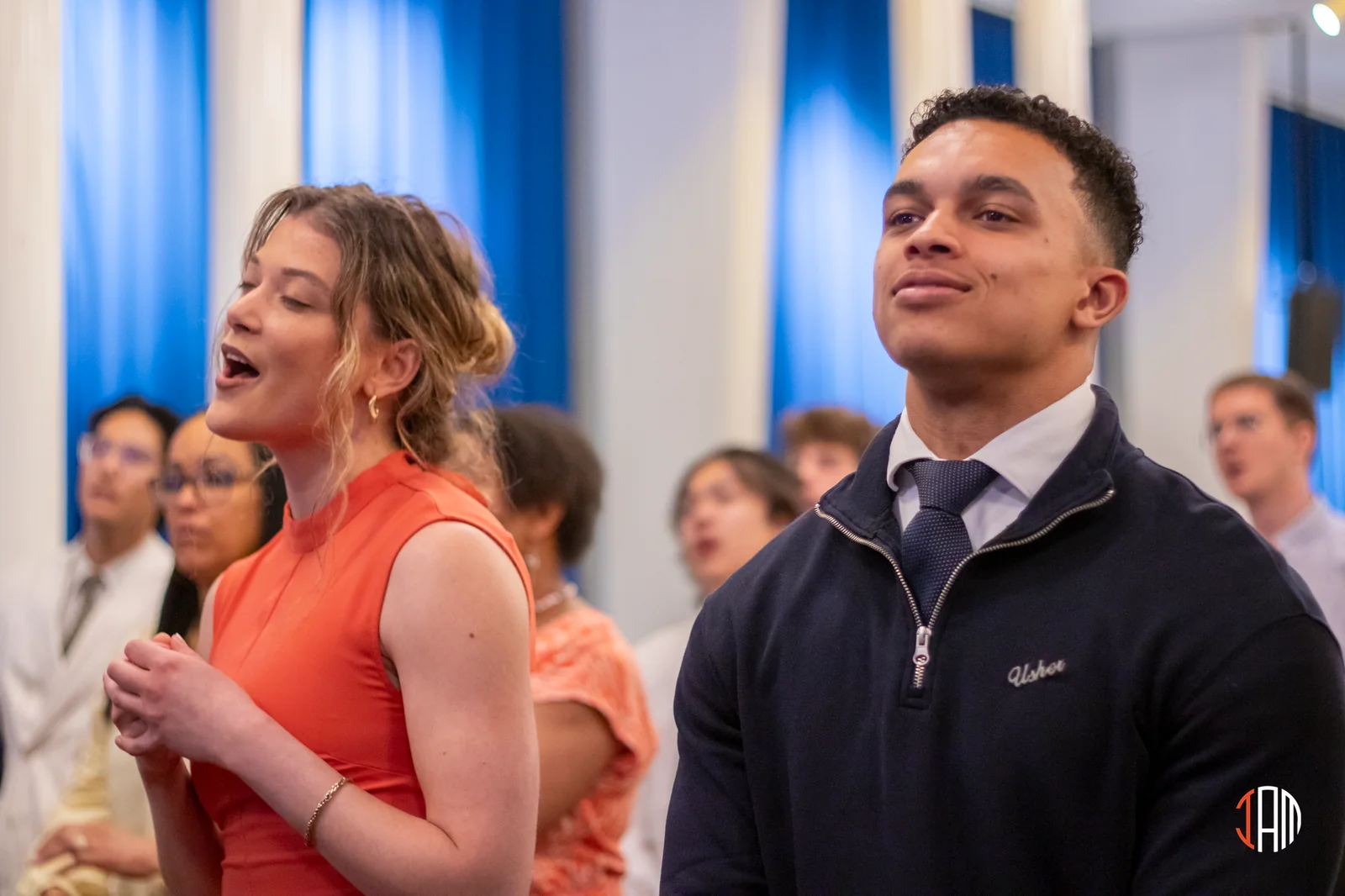 People singing together in the congregation